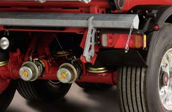 The paver brake controls the brake pressure during unloading